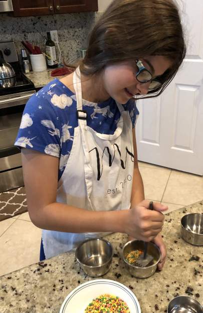 Sarah preparing cake decorations